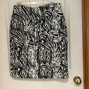 Animal print mini skirt. Nice thick polyester fabric.